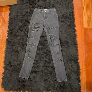 Grey/black ripped jeans used